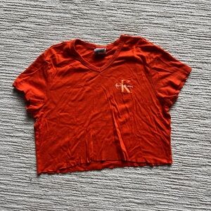 Orange Calvin Klein V-neck crop top